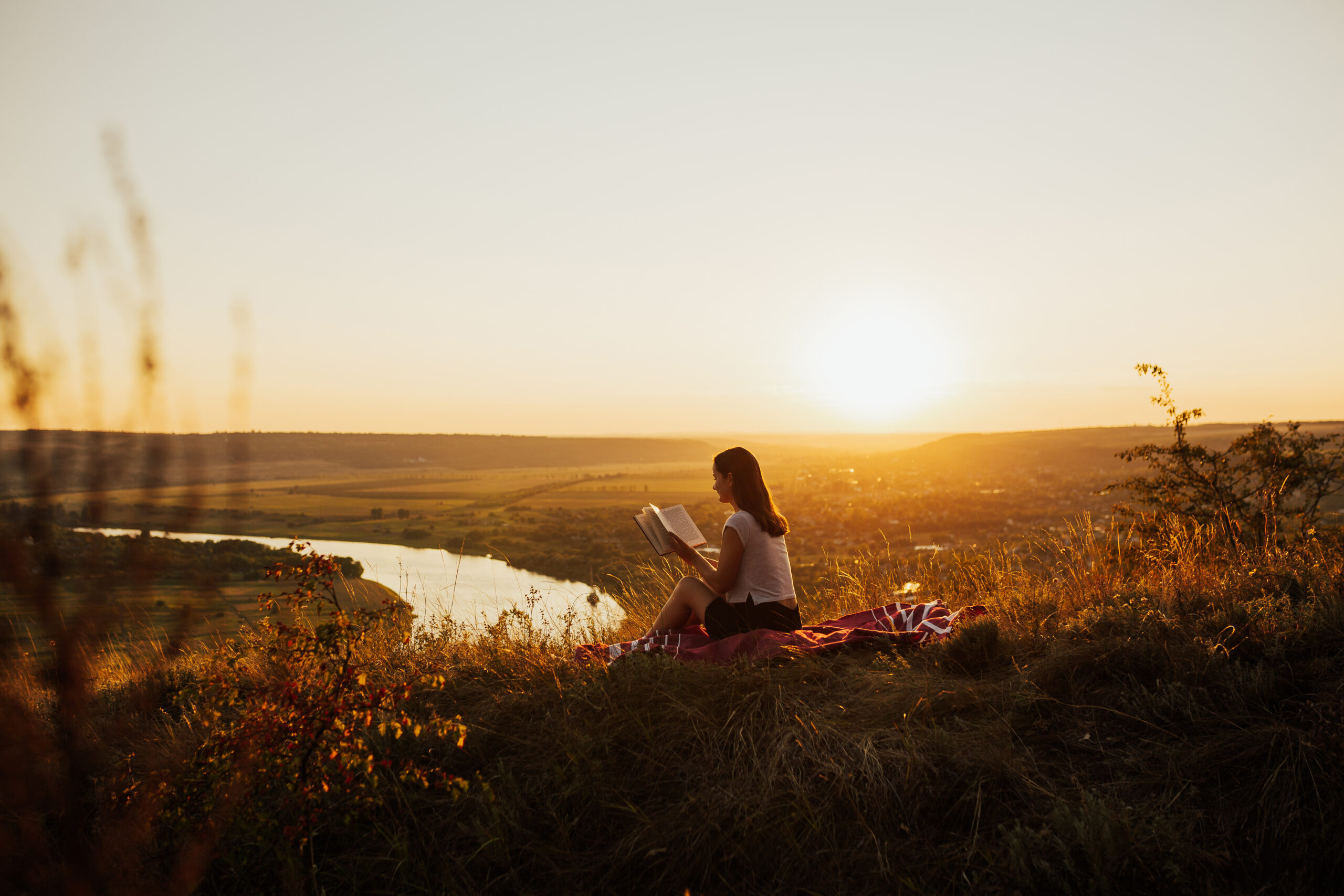 Silent reading breakfast by the river